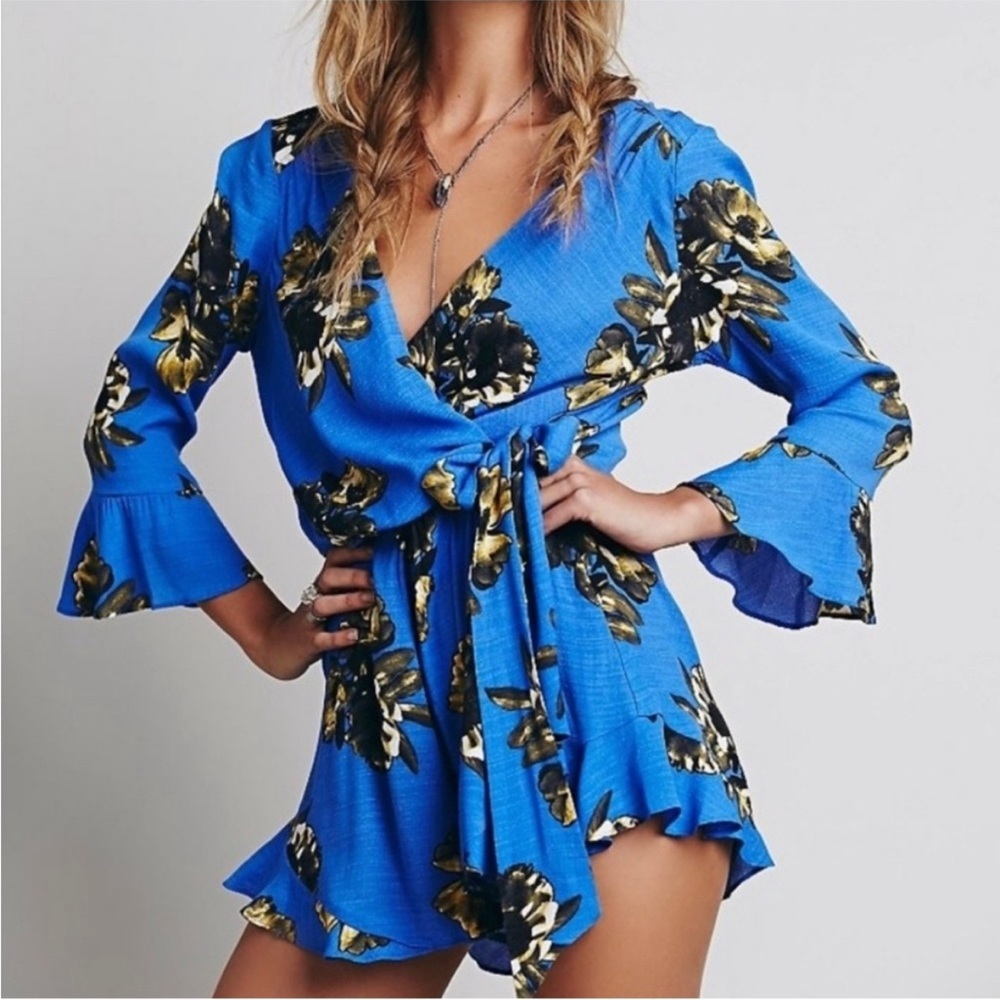 Free people blue wrap around romper, size 4